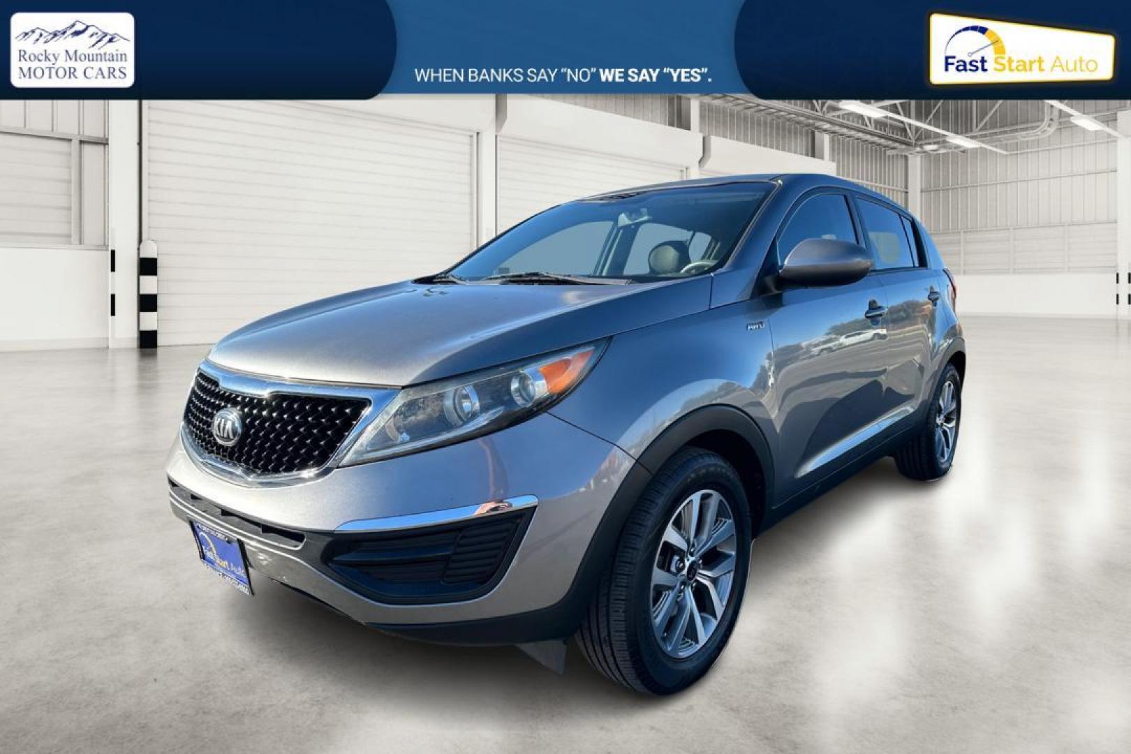 2016 Silver Kia Sportage LX AWD (KNDPBCAC7G7) with an 2.4L V6 DOHC 24V engine, 6-Speed Automatic transmission, located at 767 S State Road, Pleasant Grove, UT, 84062, (801) 785-1058, 40.354839, -111.736687 - Photo#8