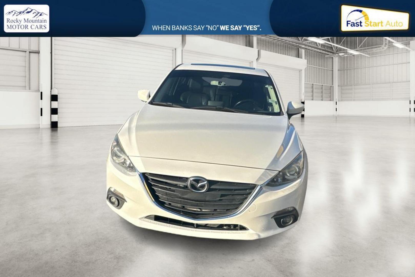 2016 White Mazda MAZDA3 i SE AT 4-Door (JM1BM1X79G1) with an 2.0L L4 DOHC 16V engine, 6A transmission, located at 7755 State Street, Midvale, UT, 84047, (801) 753-9063, 40.610329, -111.892159 - Photo#7
