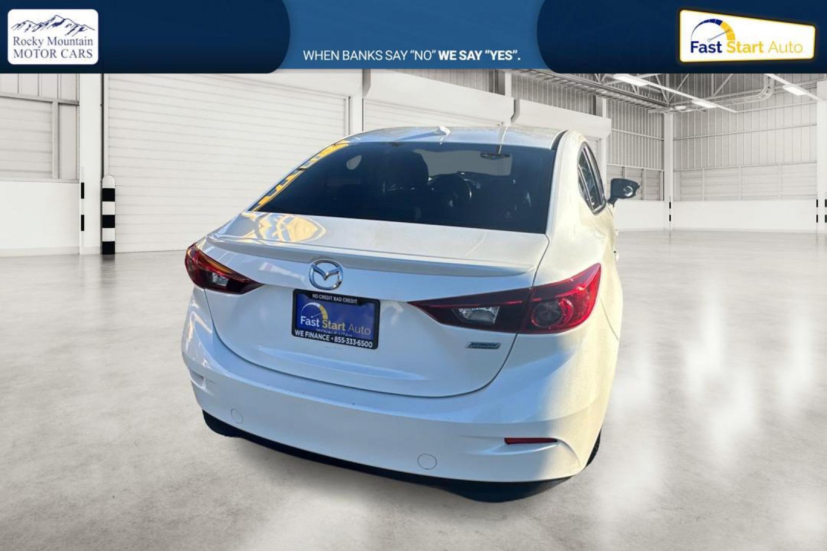 2016 White Mazda MAZDA3 i SE AT 4-Door (JM1BM1X79G1) with an 2.0L L4 DOHC 16V engine, 6A transmission, located at 7755 State Street, Midvale, UT, 84047, (801) 753-9063, 40.610329, -111.892159 - Photo#3