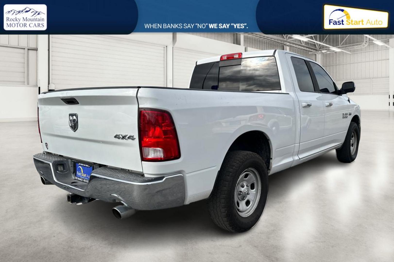 2016 White RAM 1500 SLT Quad Cab 4WD (1C6RR7GTXGS) with an 5.7L V8 OHV 16V engine, 6A transmission, located at 7755 State Street, Midvale, UT, 84047, (801) 753-9063, 40.610329, -111.892159 - Photo#2