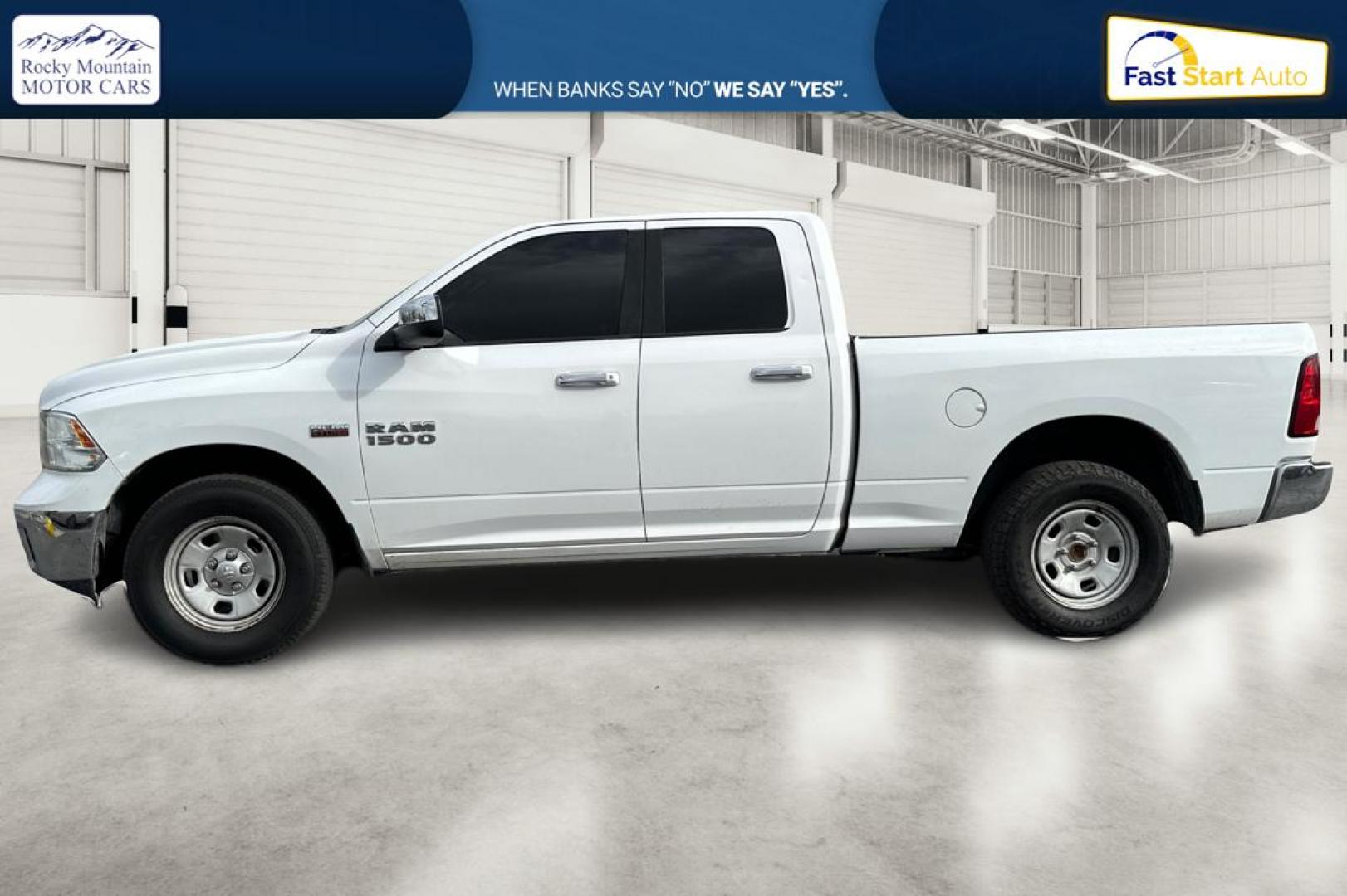2016 White RAM 1500 SLT Quad Cab 4WD (1C6RR7GTXGS) with an 5.7L V8 OHV 16V engine, 6A transmission, located at 7755 State Street, Midvale, UT, 84047, (801) 753-9063, 40.610329, -111.892159 - Photo#6