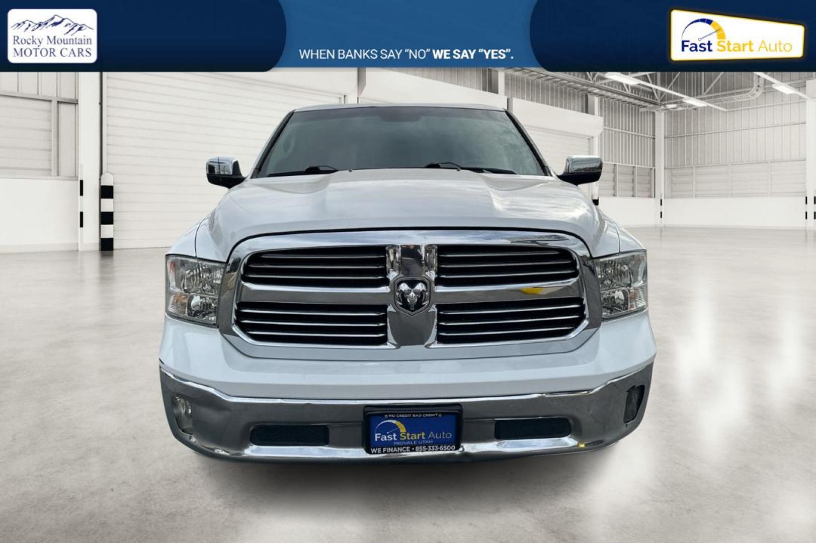 2016 White RAM 1500 SLT Quad Cab 4WD (1C6RR7GTXGS) with an 5.7L V8 OHV 16V engine, 6A transmission, located at 7755 State Street, Midvale, UT, 84047, (801) 753-9063, 40.610329, -111.892159 - Photo#9