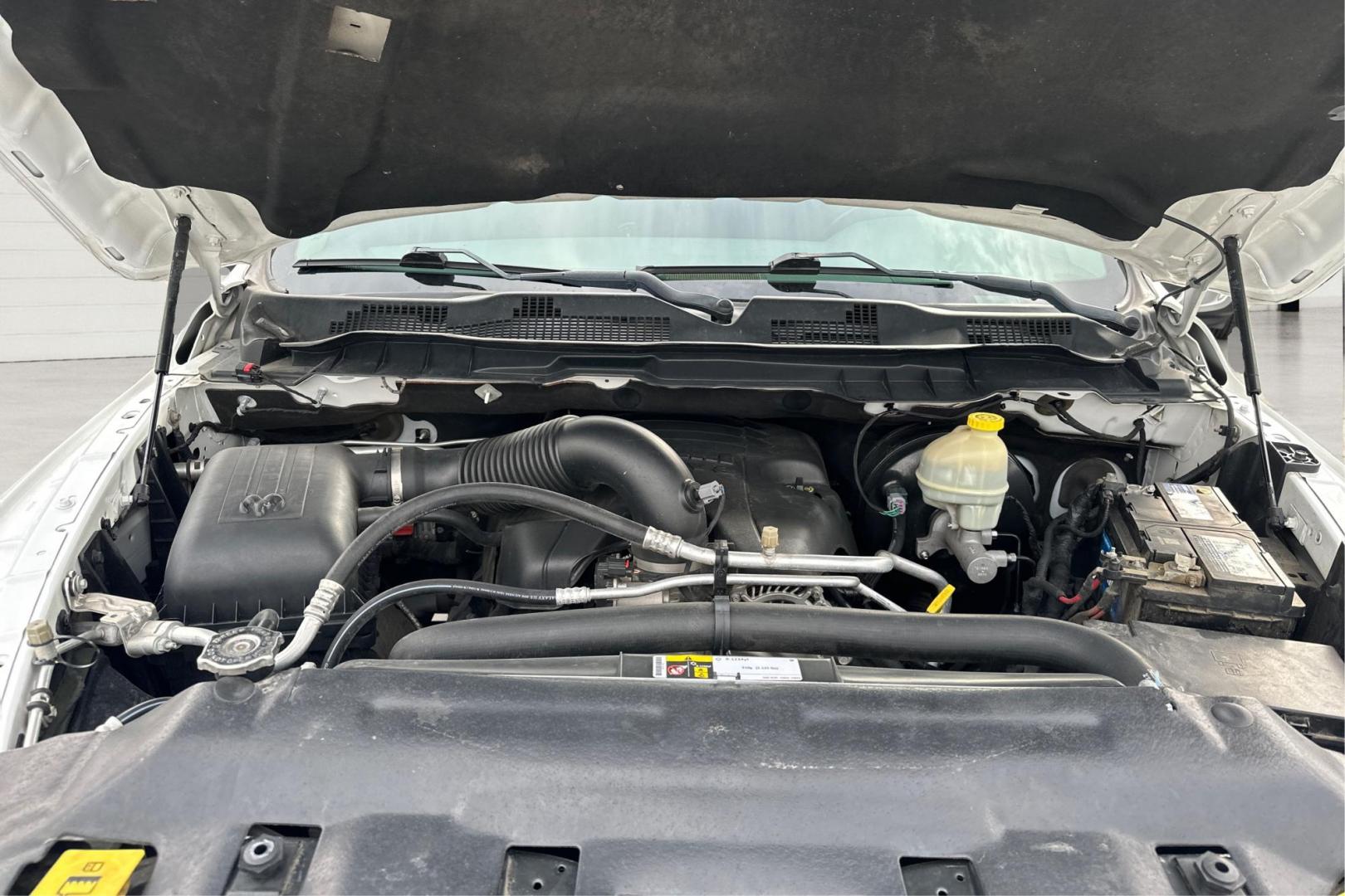 2016 White RAM 1500 SLT Quad Cab 4WD (1C6RR7GTXGS) with an 5.7L V8 OHV 16V engine, 6A transmission, located at 7755 State Street, Midvale, UT, 84047, (801) 753-9063, 40.610329, -111.892159 - Photo#10