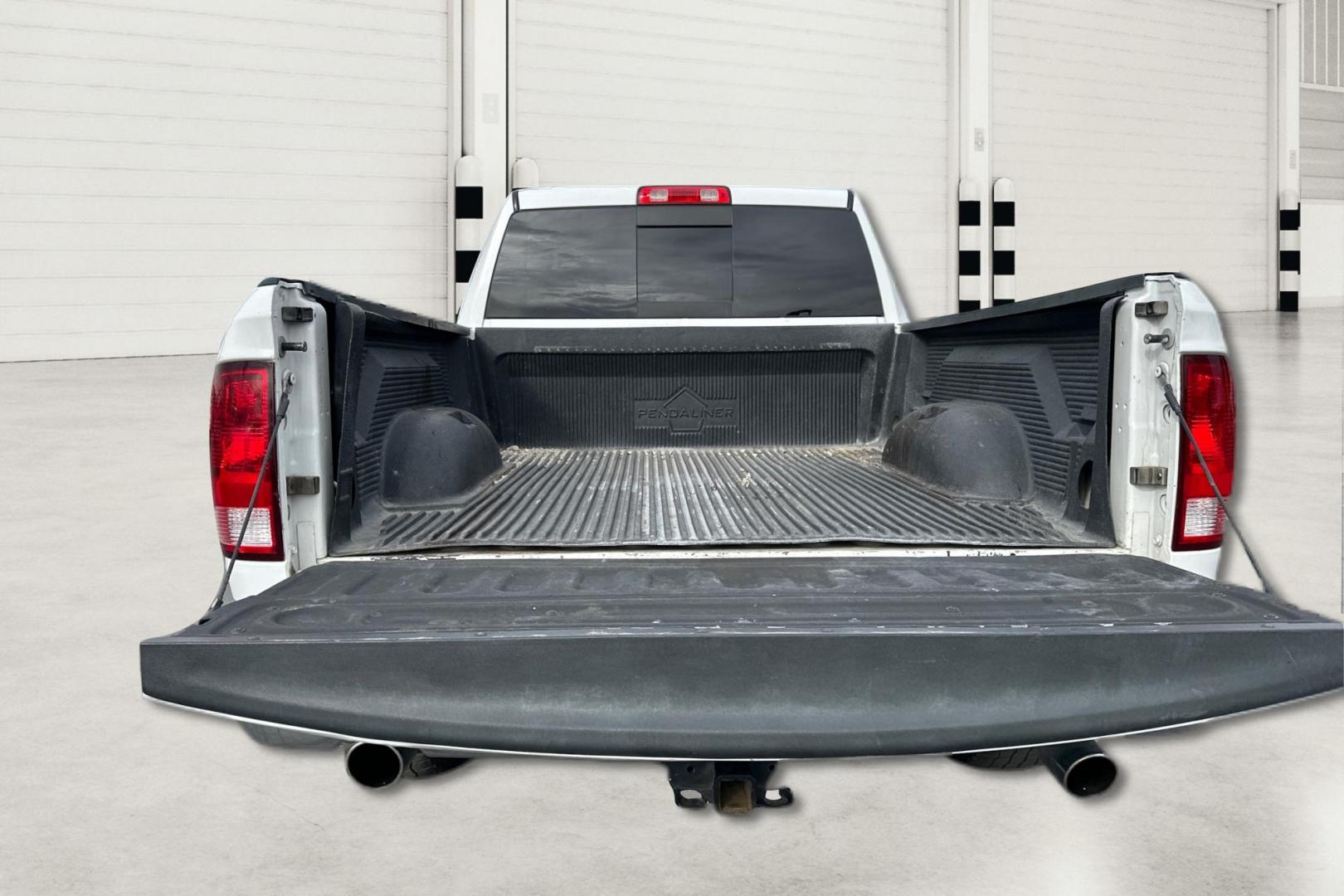 2016 White RAM 1500 SLT Quad Cab 4WD (1C6RR7GTXGS) with an 5.7L V8 OHV 16V engine, 6A transmission, located at 7755 State Street, Midvale, UT, 84047, (801) 753-9063, 40.610329, -111.892159 - Photo#13
