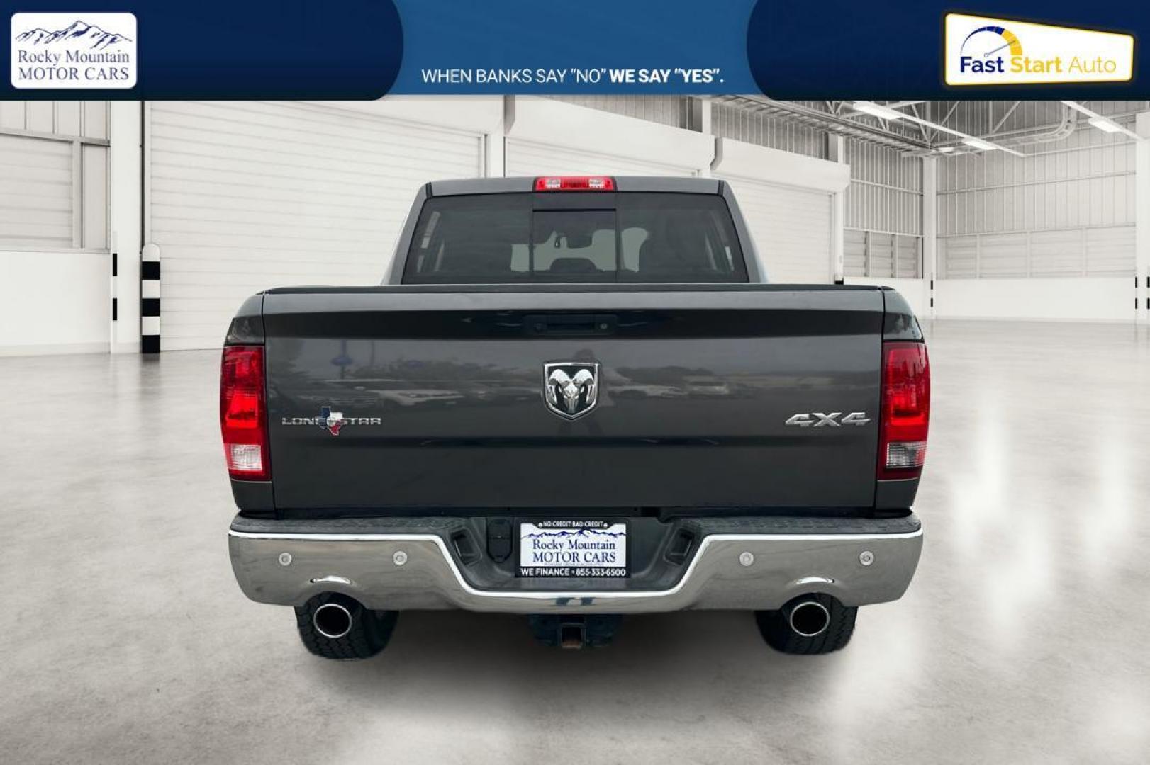 2016 Gray RAM 1500 SLT Crew Cab SWB 4WD (1C6RR7LT0GS) with an 5.7L V8 OHV 16V engine, 6A transmission, located at 767 S State Road, Pleasant Grove, UT, 84062, (801) 785-1058, 40.354839, -111.736687 - Photo#4