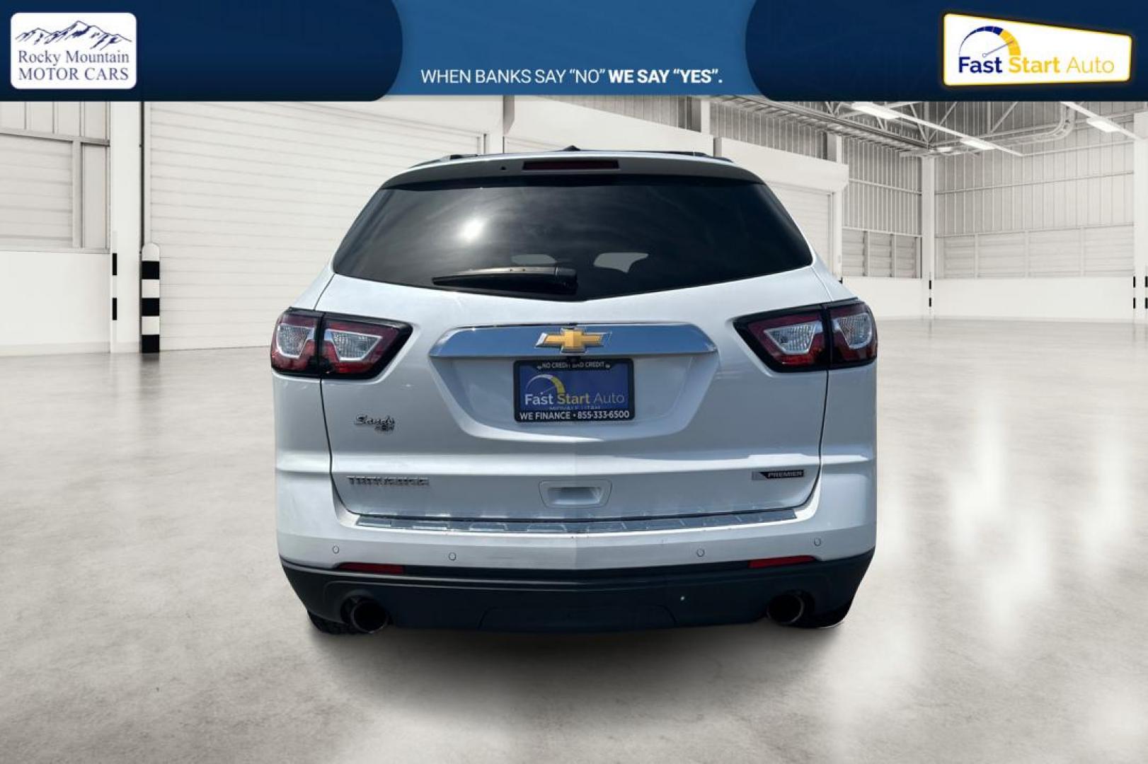 2017 White Chevrolet Traverse Premier FWD (1GNKRJKDXHJ) with an 3.6L V6 DOHC 24V engine, 6A transmission, located at 767 S State Road, Pleasant Grove, UT, 84062, (801) 785-1058, 40.354839, -111.736687 - Photo#4