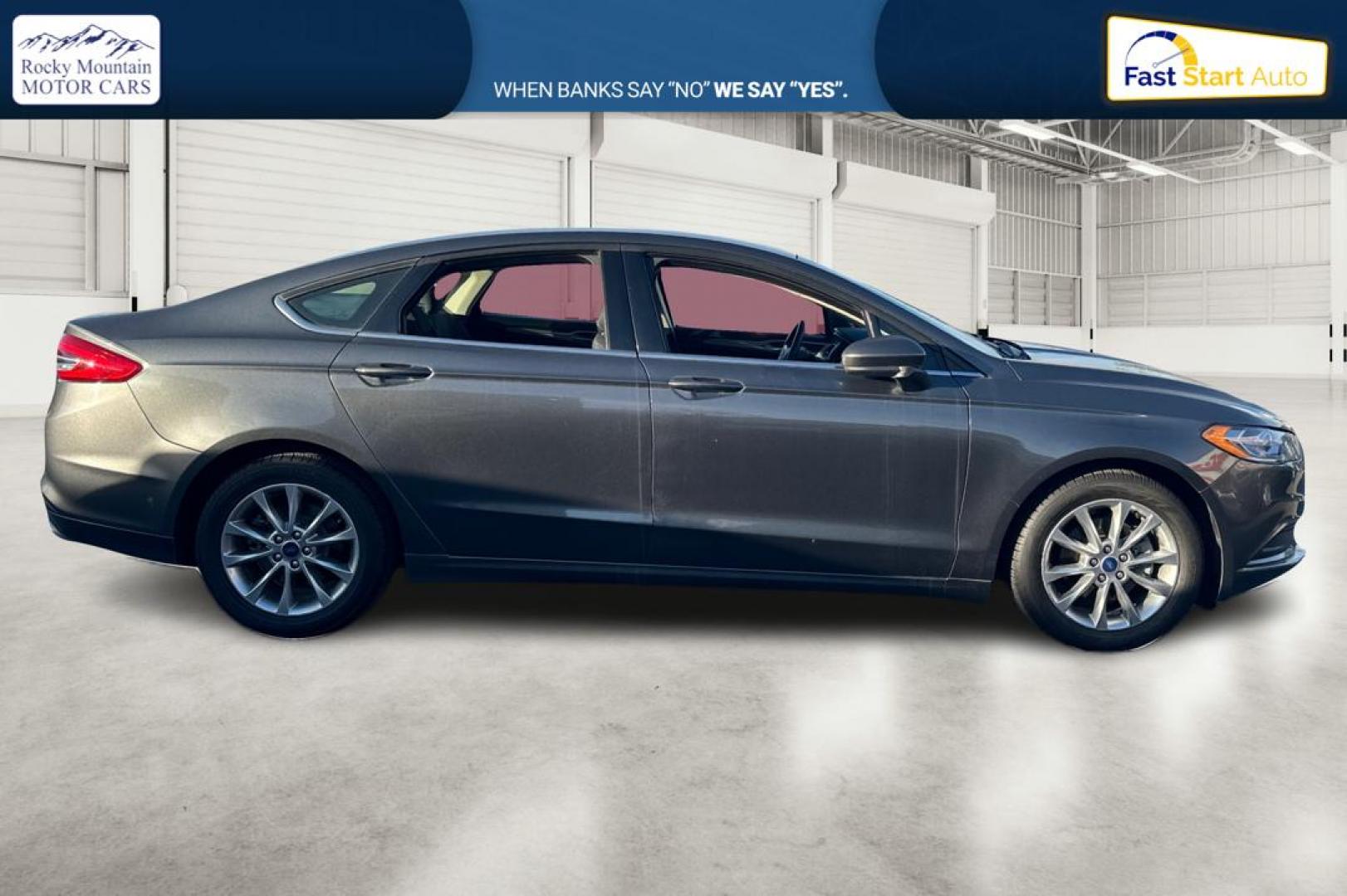 2017 Gray Ford Fusion SE (3FA6P0H74HR) with an 2.5L L4 DOHC 16V engine, 6A transmission, located at 767 S State Road, Pleasant Grove, UT, 84062, (801) 785-1058, 40.354839, -111.736687 - Photo#1