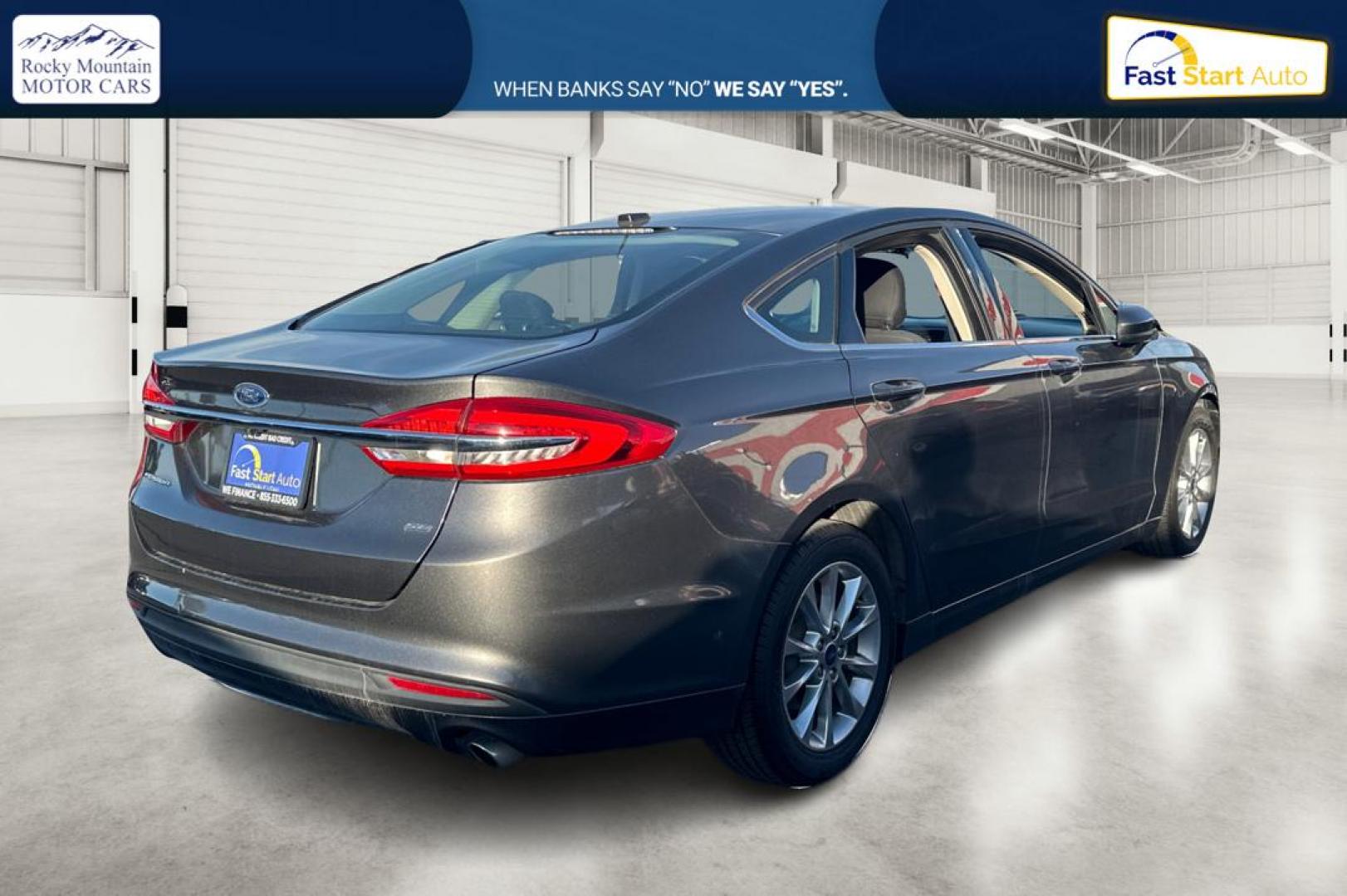 2017 Gray Ford Fusion SE (3FA6P0H74HR) with an 2.5L L4 DOHC 16V engine, 6A transmission, located at 767 S State Road, Pleasant Grove, UT, 84062, (801) 785-1058, 40.354839, -111.736687 - Photo#2