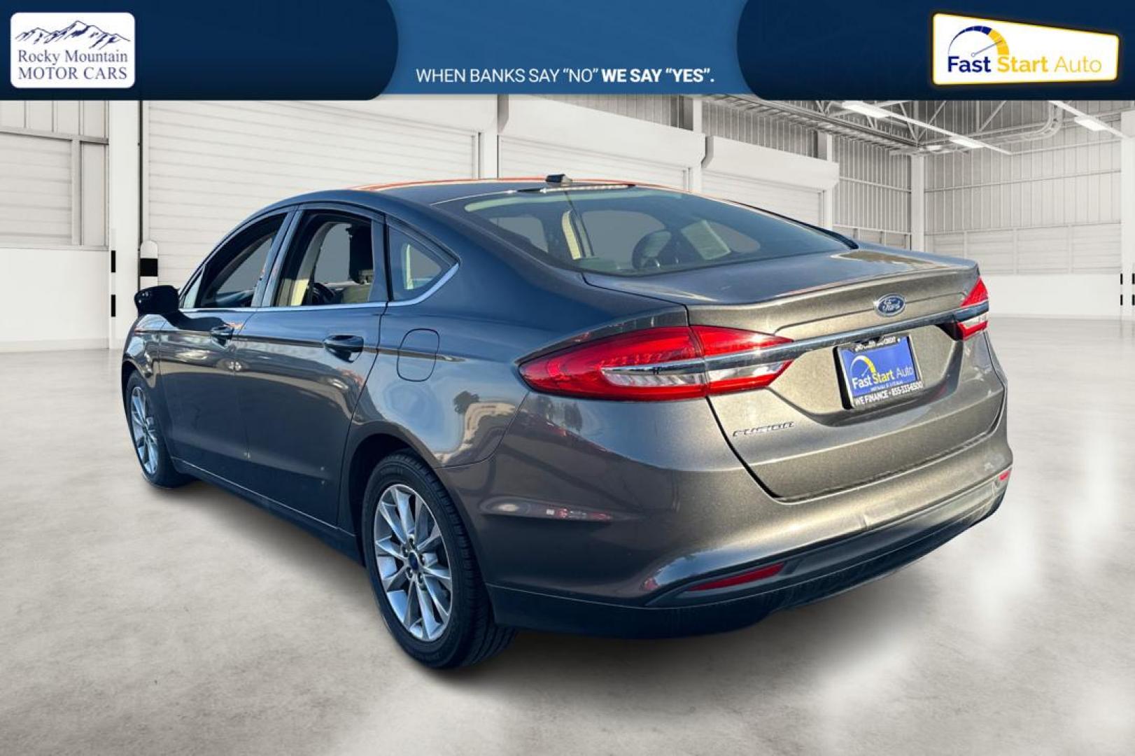 2017 Gray Ford Fusion SE (3FA6P0H74HR) with an 2.5L L4 DOHC 16V engine, 6A transmission, located at 767 S State Road, Pleasant Grove, UT, 84062, (801) 785-1058, 40.354839, -111.736687 - Photo#5