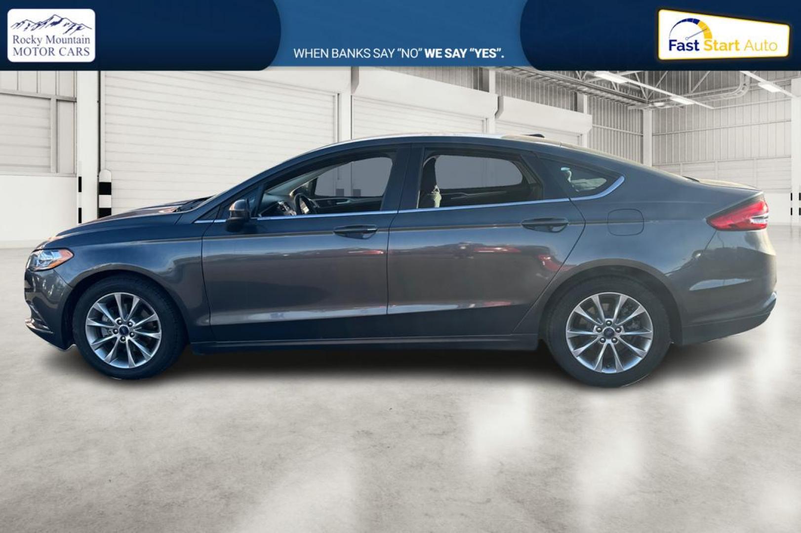 2017 Gray Ford Fusion SE (3FA6P0H74HR) with an 2.5L L4 DOHC 16V engine, 6A transmission, located at 767 S State Road, Pleasant Grove, UT, 84062, (801) 785-1058, 40.354839, -111.736687 - Photo#6