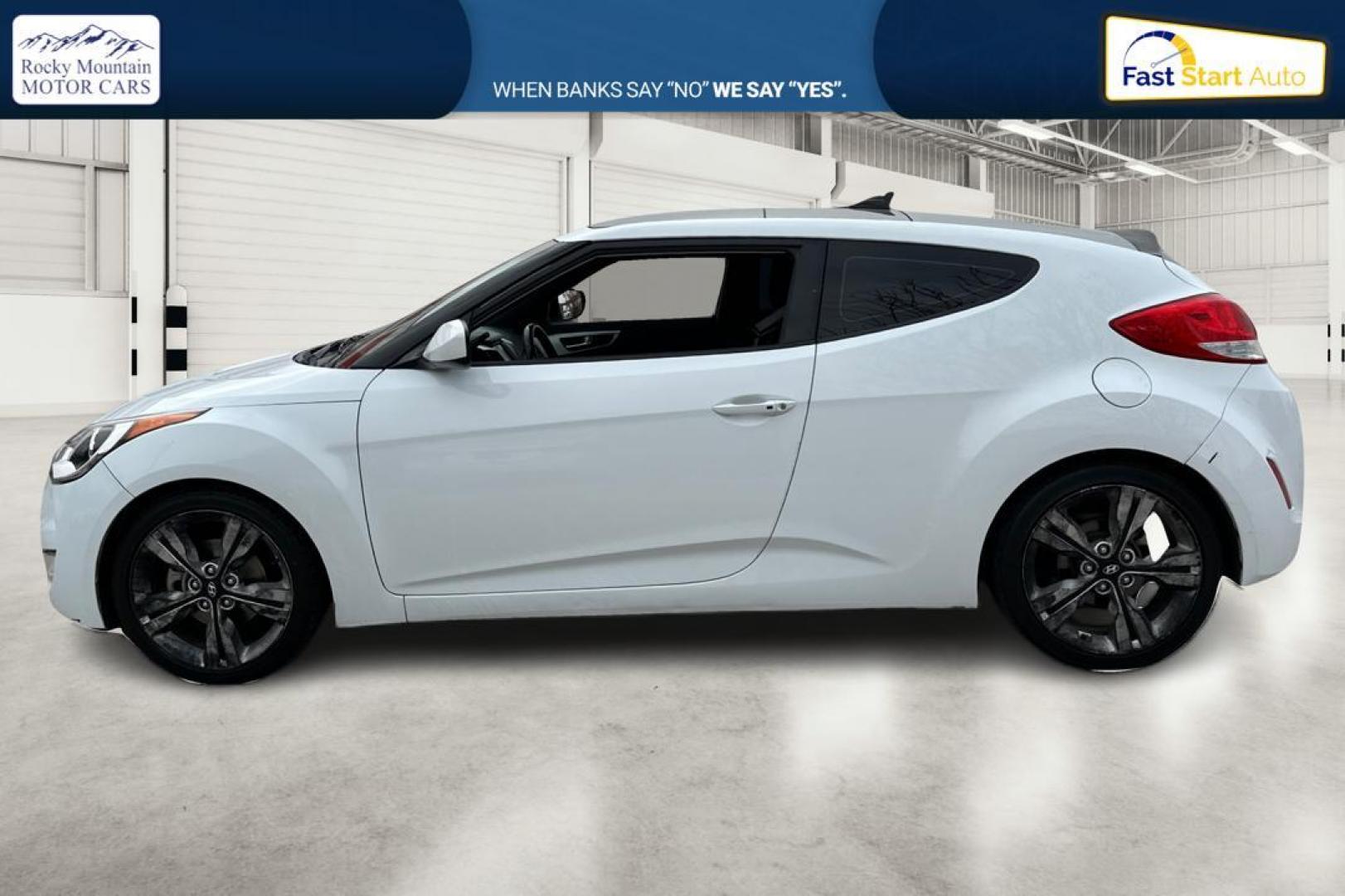 2017 White Hyundai Veloster Base 6MT (KMHTC6AD7HU) with an 1.6L L4 DOHC 16V engine, 6M transmission, located at 767 S State Road, Pleasant Grove, UT, 84062, (801) 785-1058, 40.354839, -111.736687 - Photo#6