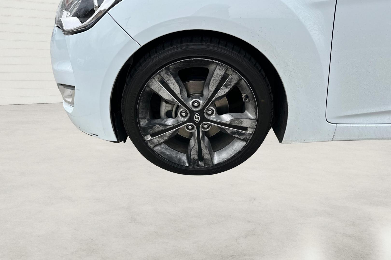 2017 White Hyundai Veloster Base 6MT (KMHTC6AD7HU) with an 1.6L L4 DOHC 16V engine, 6M transmission, located at 767 S State Road, Pleasant Grove, UT, 84062, (801) 785-1058, 40.354839, -111.736687 - Photo#12