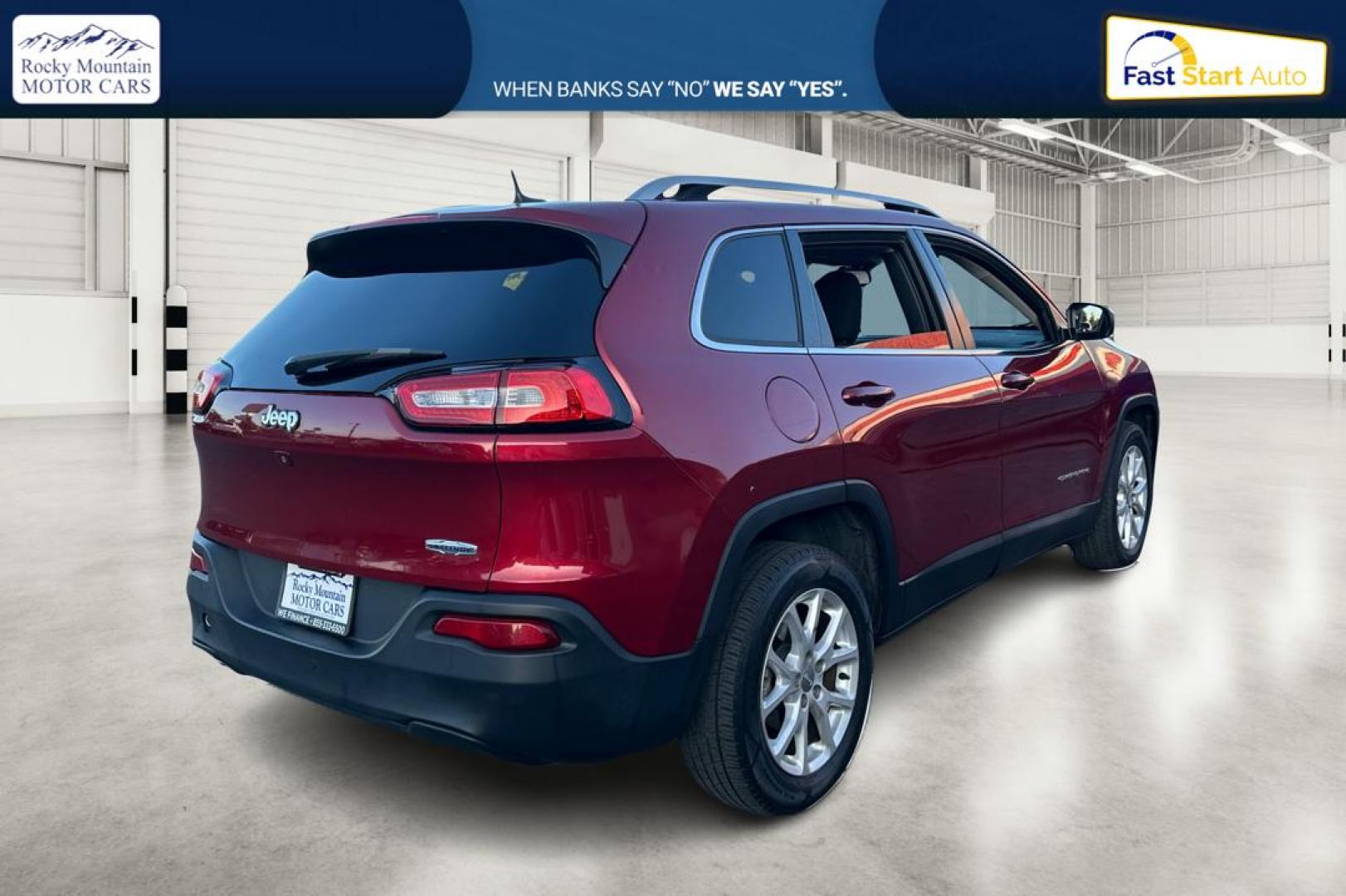 2017 Red Jeep Cherokee Latitude FWD (1C4PJLCB0HD) with an 2.4L L4 DOHC 16V engine, 9A transmission, located at 767 S State Road, Pleasant Grove, UT, 84062, (801) 785-1058, 40.354839, -111.736687 - Photo#2