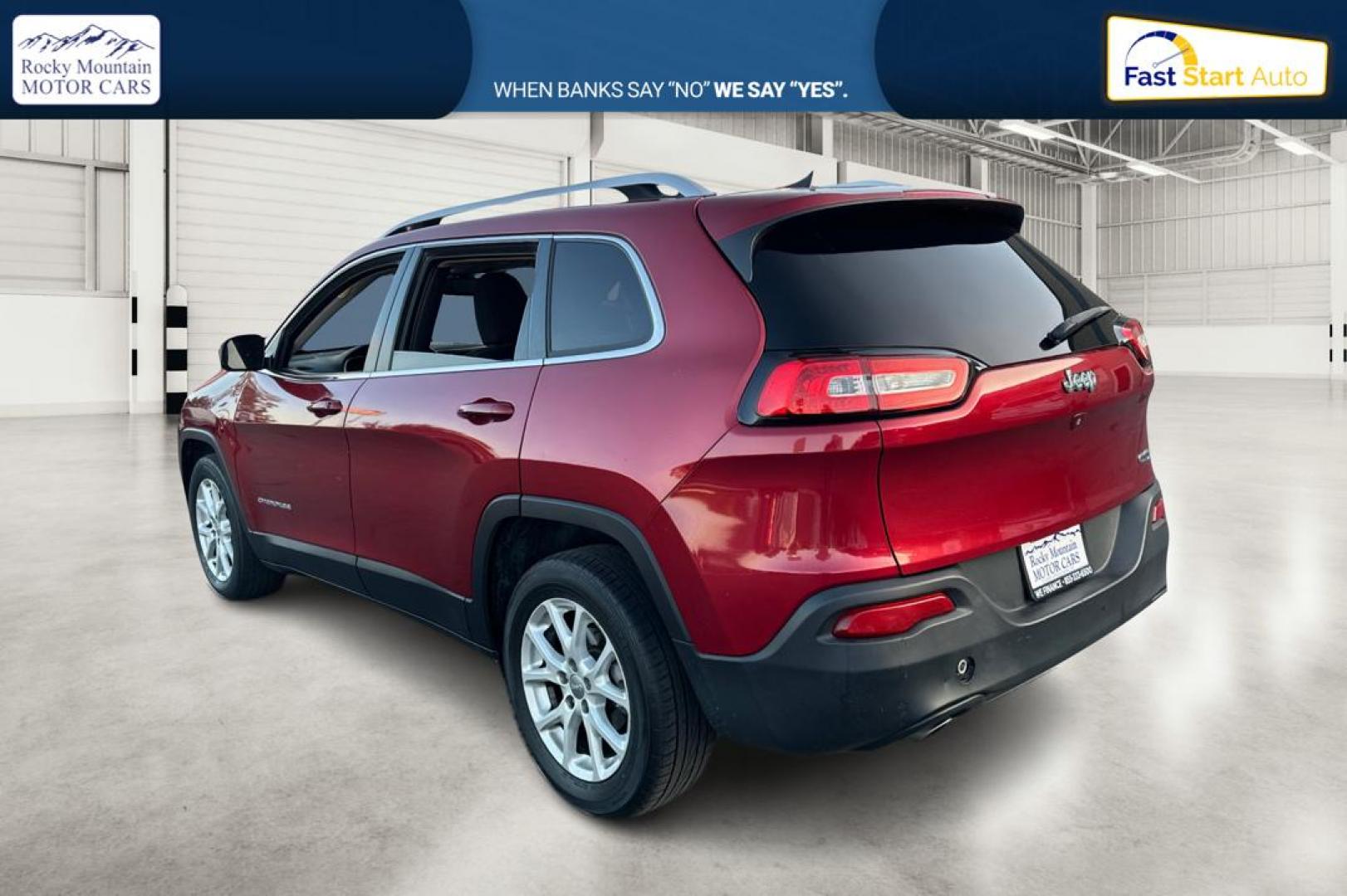 2017 Red Jeep Cherokee Latitude FWD (1C4PJLCB0HD) with an 2.4L L4 DOHC 16V engine, 9A transmission, located at 767 S State Road, Pleasant Grove, UT, 84062, (801) 785-1058, 40.354839, -111.736687 - Photo#5