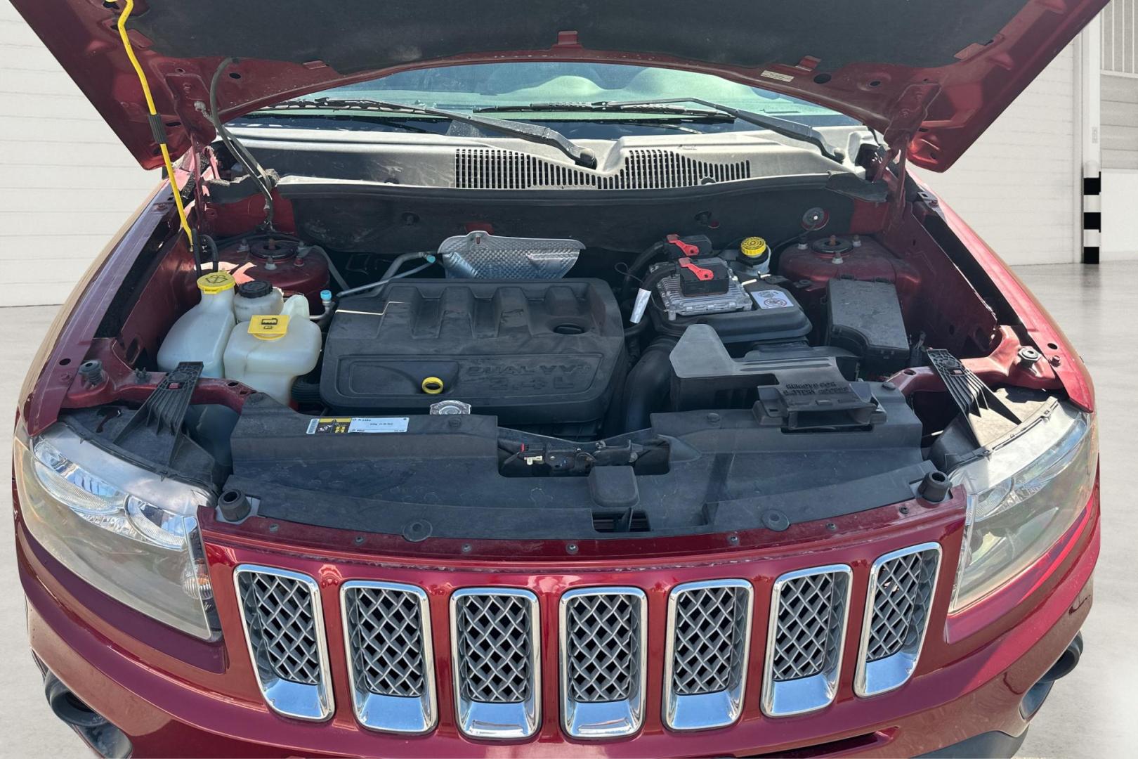 2017 Red Jeep Compass Latitude FWD (1C4NJCEB3HD) with an 2.4L L4 DOHC 16V engine, CVT transmission, located at 767 S State Road, Pleasant Grove, UT, 84062, (801) 785-1058, 40.354839, -111.736687 - Photo#8