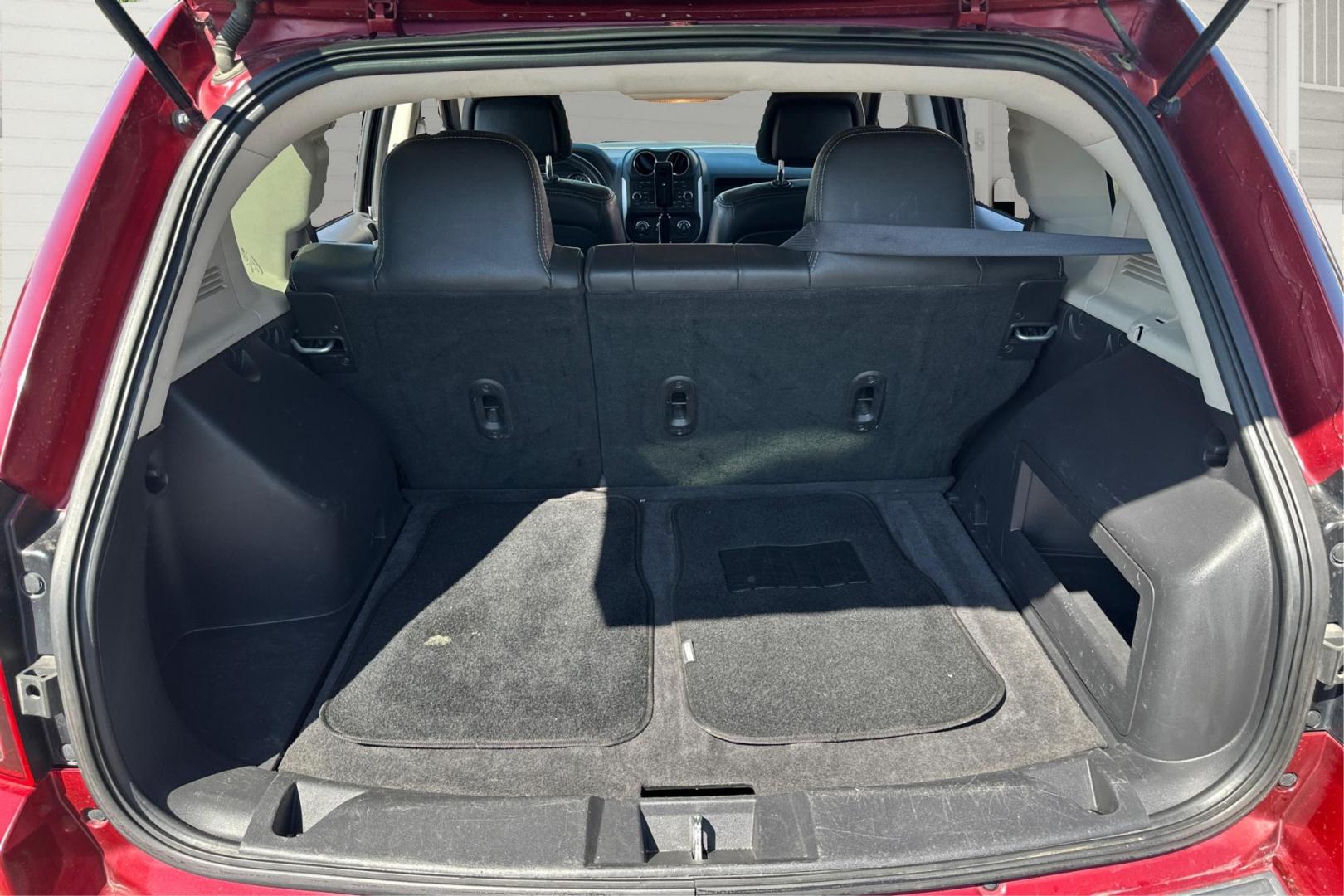 2017 Red Jeep Compass Latitude FWD (1C4NJCEB3HD) with an 2.4L L4 DOHC 16V engine, CVT transmission, located at 767 S State Road, Pleasant Grove, UT, 84062, (801) 785-1058, 40.354839, -111.736687 - Photo#10