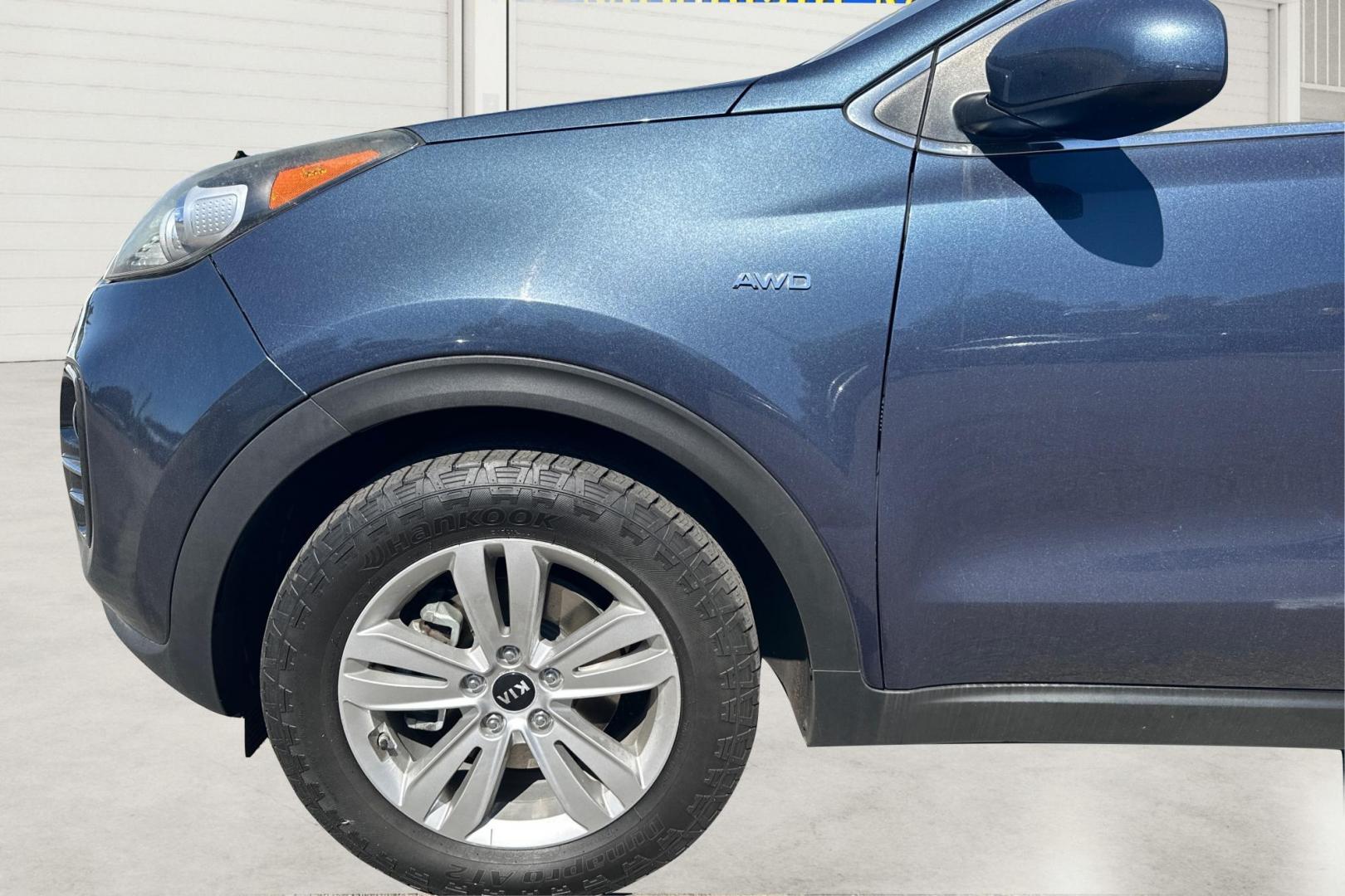 2017 Blue Kia Sportage LX AWD (KNDPMCAC1H7) with an 2.4L V6 DOHC 24V engine, 6A transmission, located at 7755 State Street, Midvale, UT, 84047, (801) 753-9063, 40.610329, -111.892159 - Photo#9