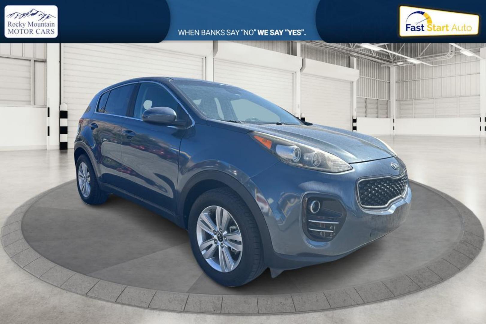 2017 Blue Kia Sportage LX AWD (KNDPMCAC1H7) with an 2.4L V6 DOHC 24V engine, 6A transmission, located at 7755 State Street, Midvale, UT, 84047, (801) 753-9063, 40.610329, -111.892159 - Photo#0