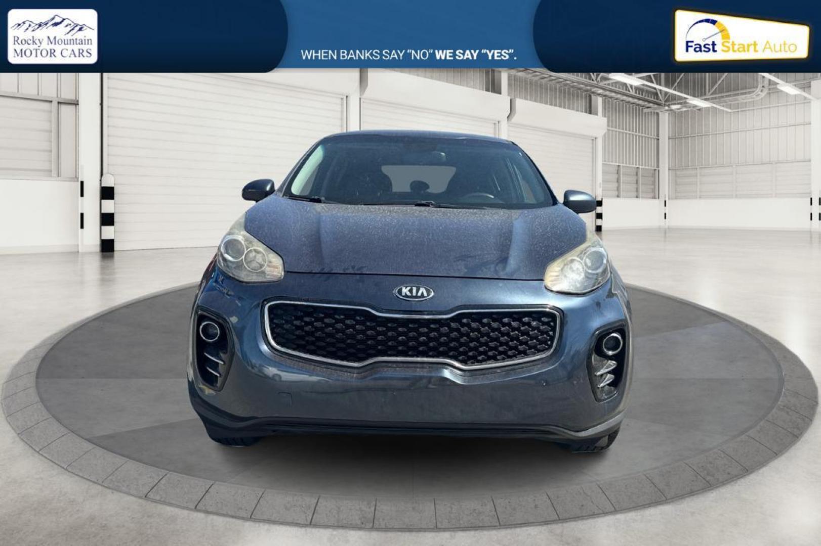 2017 Blue Kia Sportage LX AWD (KNDPMCAC1H7) with an 2.4L V6 DOHC 24V engine, 6A transmission, located at 7755 State Street, Midvale, UT, 84047, (801) 753-9063, 40.610329, -111.892159 - Photo#7