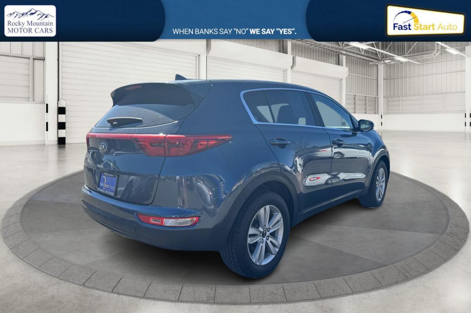 2017 Blue Kia Sportage LX AWD (KNDPMCAC1H7) with an 2.4L V6 DOHC 24V engine, 6A transmission, located at 7755 State Street, Midvale, UT, 84047, (801) 753-9063, 40.610329, -111.892159 - Photo#2
