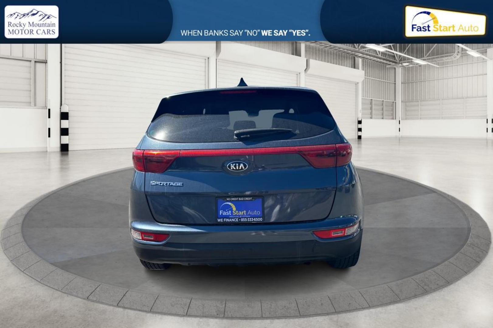 2017 Blue Kia Sportage LX AWD (KNDPMCAC1H7) with an 2.4L V6 DOHC 24V engine, 6A transmission, located at 7755 State Street, Midvale, UT, 84047, (801) 753-9063, 40.610329, -111.892159 - Photo#3