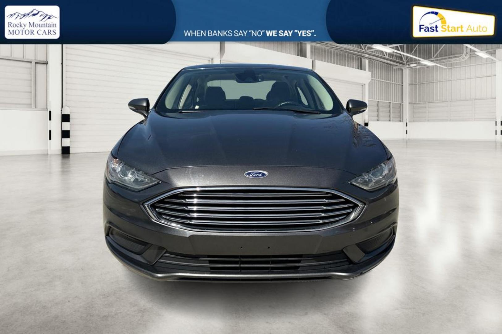 2018 Gray Ford Fusion SE (3FA6P0HD7JR) with an 1.5L L4 DOHC 16V engine, 6A transmission, located at 767 S State Road, Pleasant Grove, UT, 84062, (801) 785-1058, 40.354839, -111.736687 - Photo#9