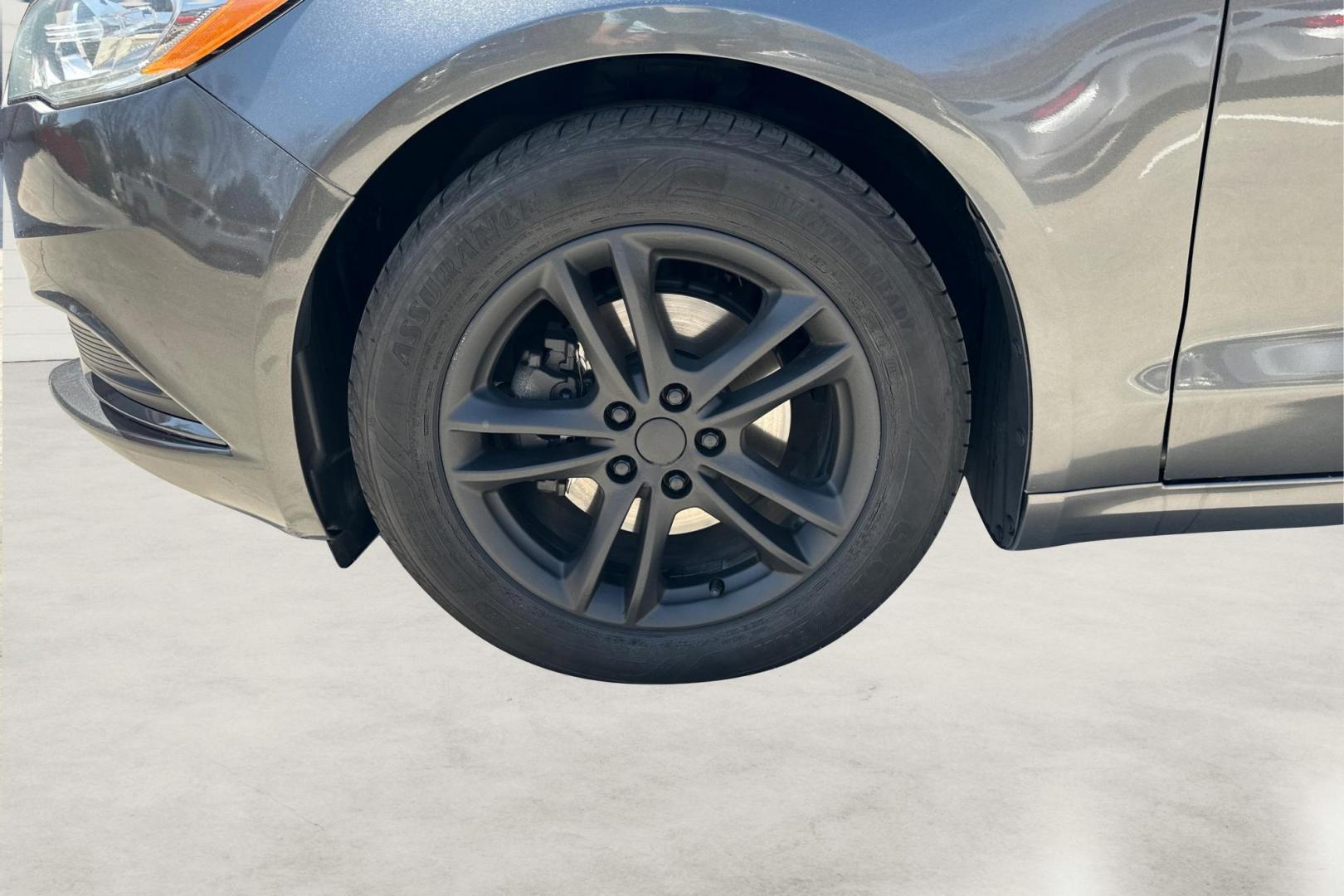 2018 Gray Ford Fusion SE (3FA6P0HD7JR) with an 1.5L L4 DOHC 16V engine, 6A transmission, located at 767 S State Road, Pleasant Grove, UT, 84062, (801) 785-1058, 40.354839, -111.736687 - Photo#12