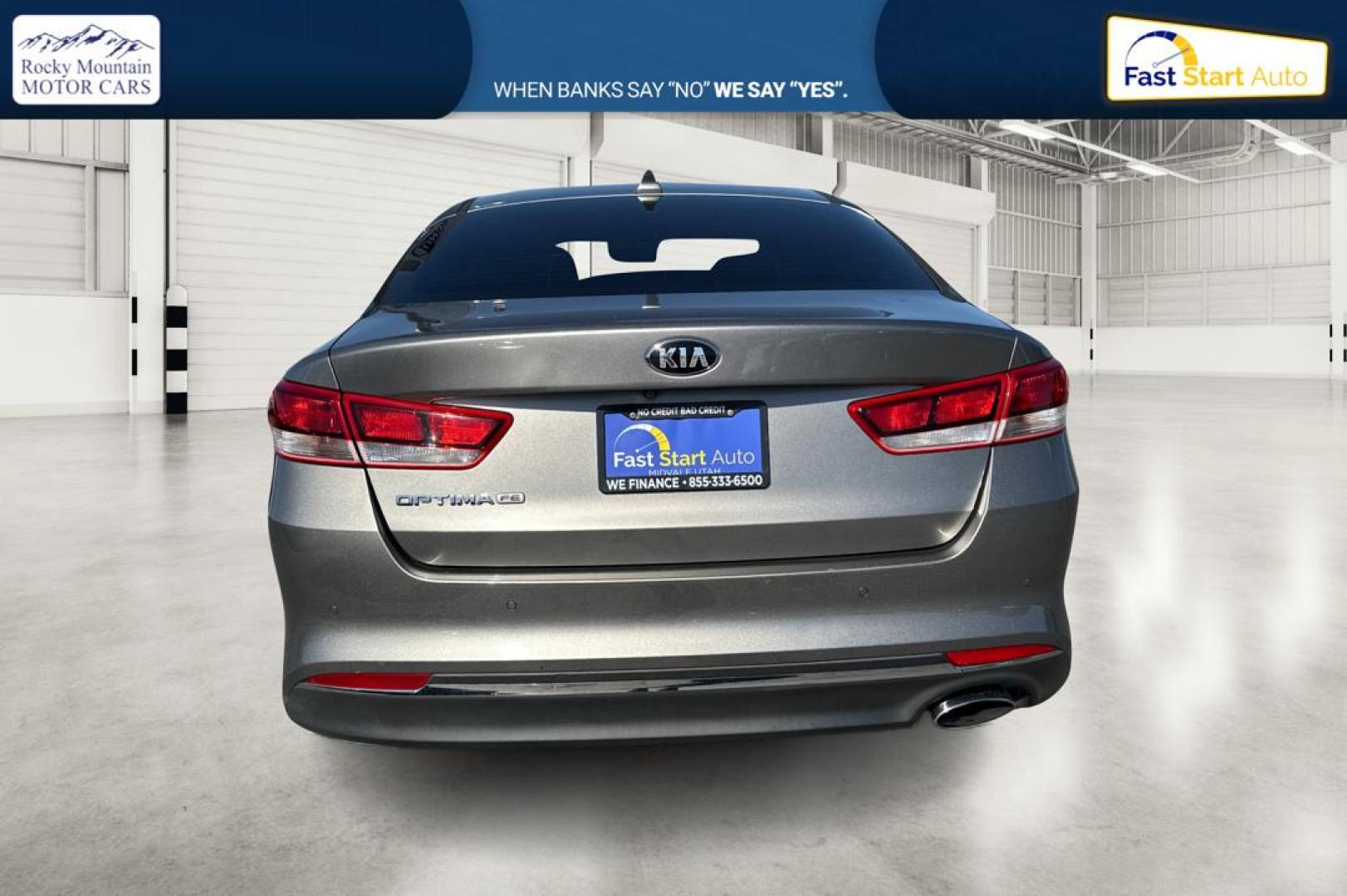 2018 Gray Kia Optima LX (5XXGT4L3XJG) with an 2.4L L4 DOHC 16V engine, 6A transmission, located at 767 S State Road, Pleasant Grove, UT, 84062, (801) 785-1058, 40.354839, -111.736687 - Photo#4