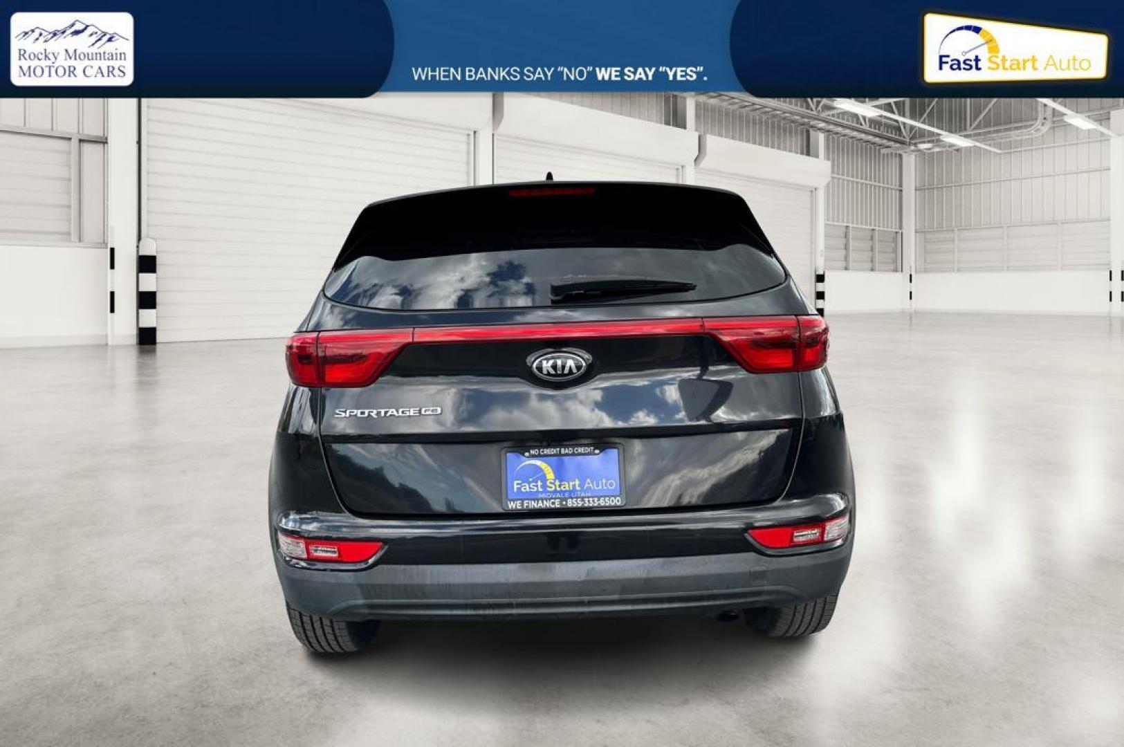 2018 Black Kia Sportage LX FWD (KNDPM3AC4J7) with an 2.4L V6 DOHC 24V engine, 6A transmission, located at 7755 State Street, Midvale, UT, 84047, (801) 753-9063, 40.610329, -111.892159 - Photo#4