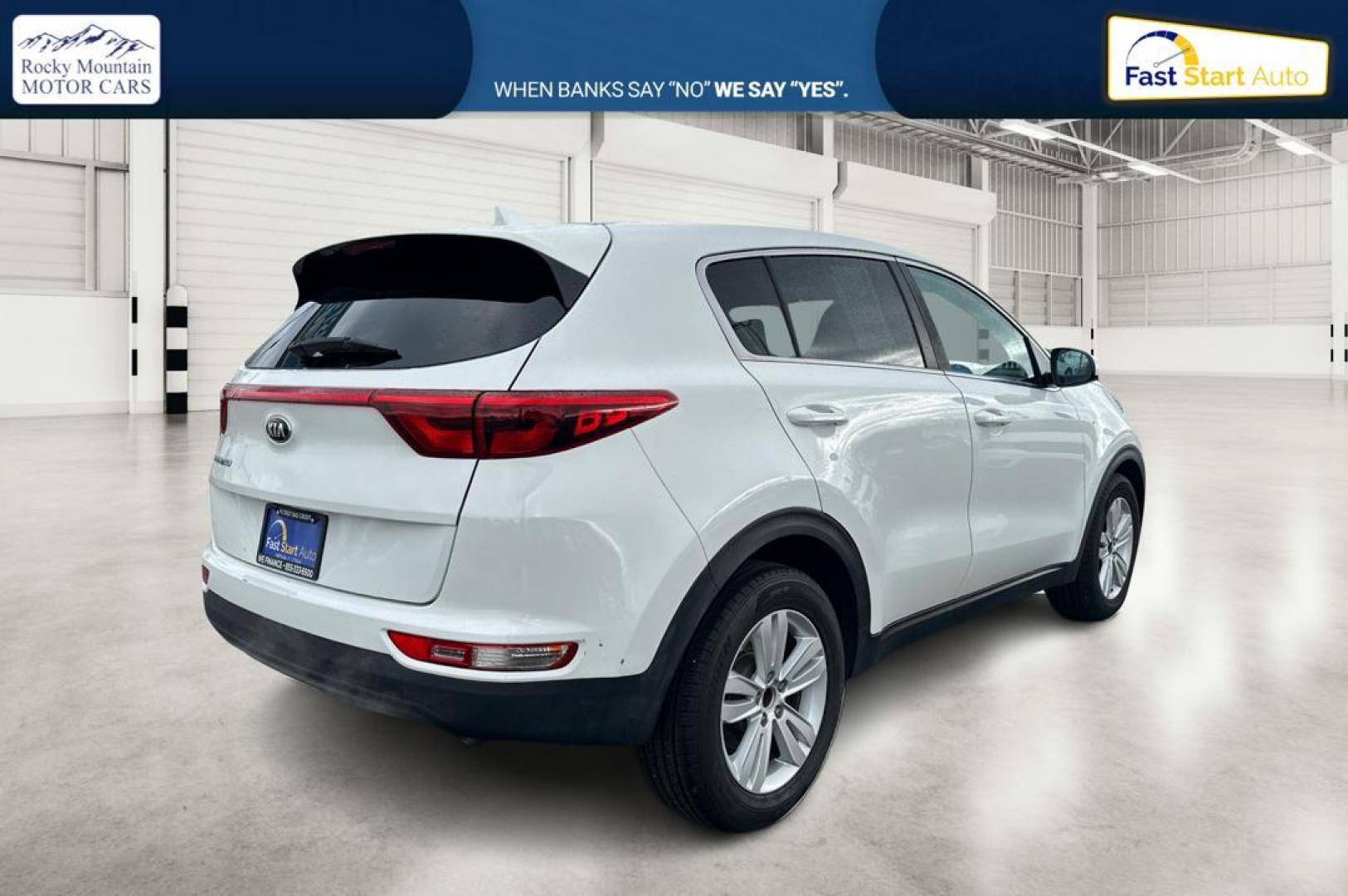 2018 White Kia Sportage LX FWD (KNDPM3AC7J7) with an 2.4L V6 DOHC 24V engine, 6A transmission, located at 7755 State Street, Midvale, UT, 84047, (801) 753-9063, 40.610329, -111.892159 - Photo#2