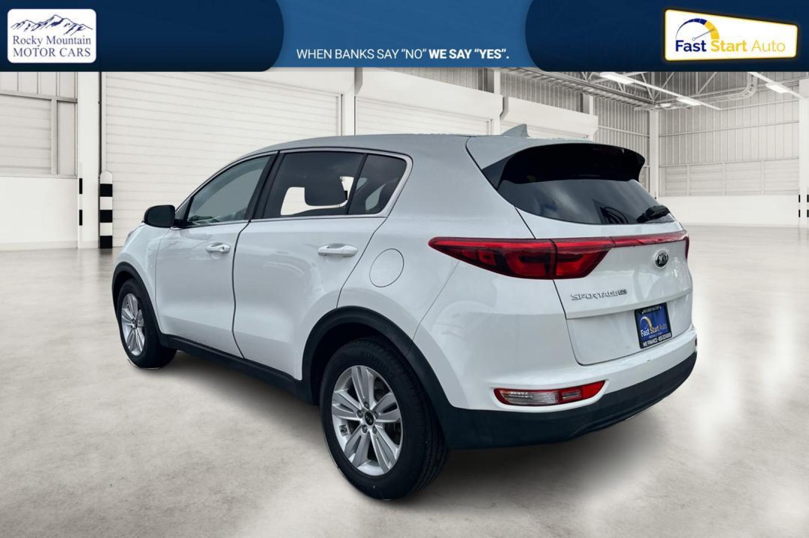 2018 White Kia Sportage LX FWD (KNDPM3AC7J7) with an 2.4L V6 DOHC 24V engine, 6A transmission, located at 7755 State Street, Midvale, UT, 84047, (801) 753-9063, 40.610329, -111.892159 - Photo#5