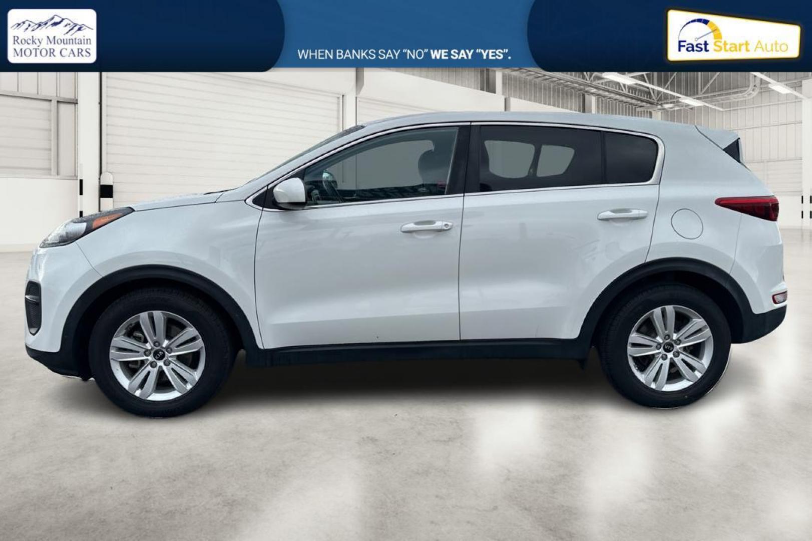 2018 White Kia Sportage LX FWD (KNDPM3AC7J7) with an 2.4L V6 DOHC 24V engine, 6A transmission, located at 7755 State Street, Midvale, UT, 84047, (801) 753-9063, 40.610329, -111.892159 - Photo#6