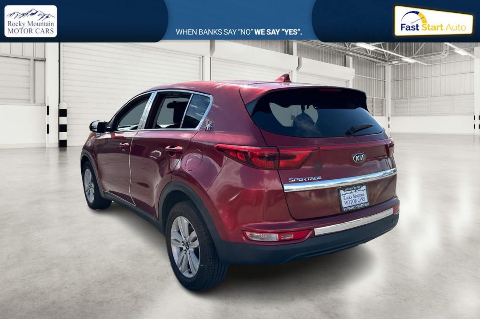 2018 Red Kia Sportage LX AWD (KNDPMCACXJ7) with an 2.4L V6 DOHC 24V engine, 6A transmission, located at 767 S State Road, Pleasant Grove, UT, 84062, (801) 785-1058, 40.354839, -111.736687 - Photo#4