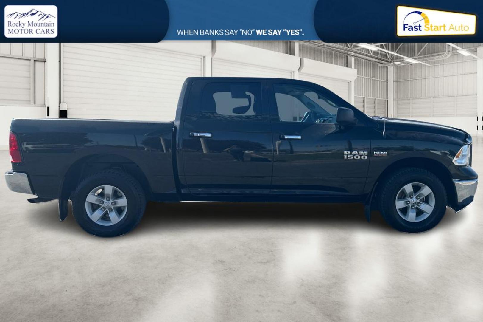 2018 Black RAM 1500 SLT Crew Cab SWB 4WD (1C6RR7LT4JS) with an 5.7L V8 OHV 16V engine, 8A transmission, located at 7755 State Street, Midvale, UT, 84047, (801) 753-9063, 40.610329, -111.892159 - Photo#1